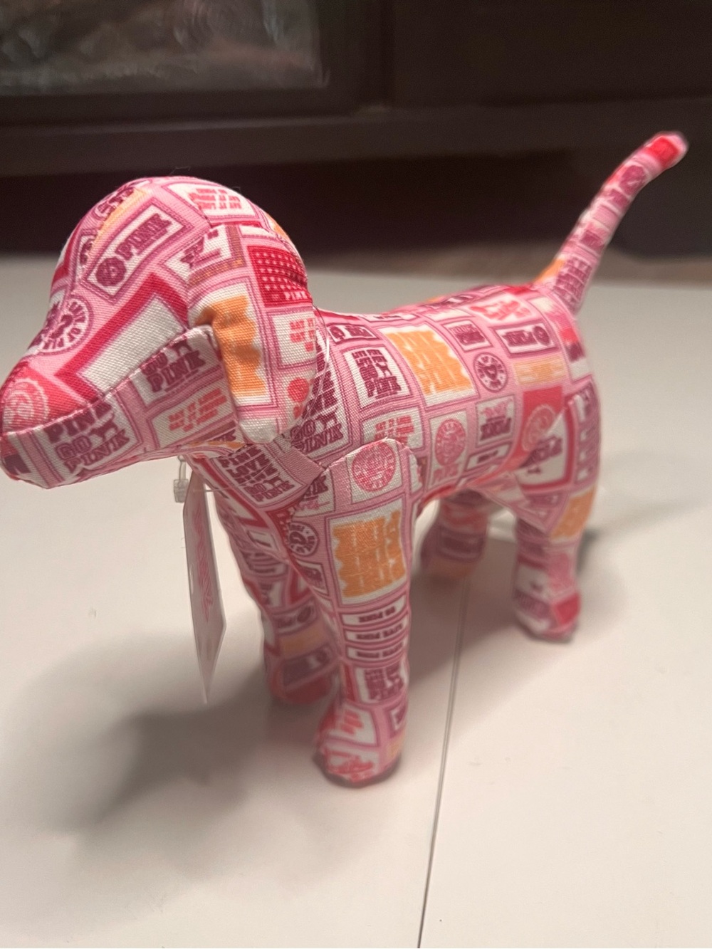 PINK Victoria's Secret Pink and Orange Patterned Plush Dog Toy